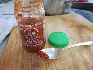 So, for each avocado, about this much sauce- I know it says 1/2 teaspoon, but this is the kind of spoon we use, and it's just on the edge...